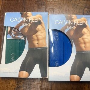 Three pair Calvin Klein boxer briefs.  Two long leg one standard length.